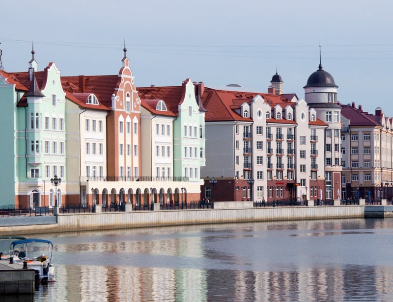 Quay of a city of Kaliningrad with a row of houses by the dock