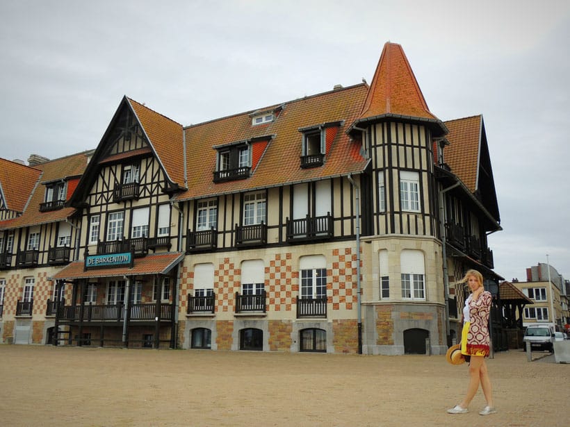 a girl in front of a building 