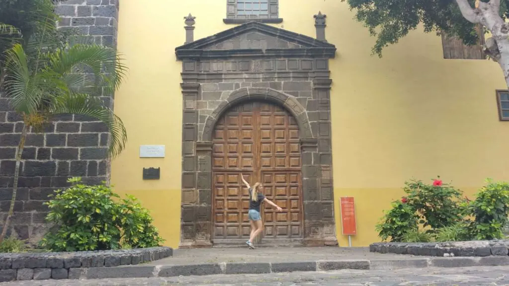 places to go in tenerife north, dancing outside large wooden door