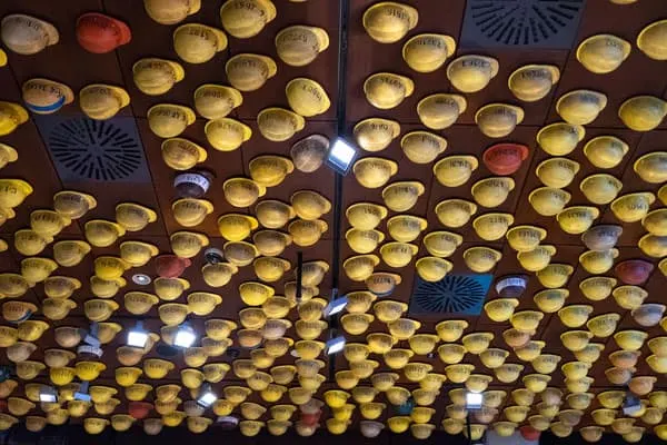 best things to see on a tour of gdansk, hard hats stuck to the wall 