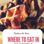 Pin with image of waffle covered in chocolate sauce with fruit with the text "Where to eat in Brussels"