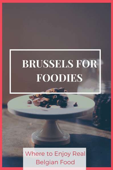 Pin with image of Belgian chocolates on an elevated plate with text reading 'Brussels for foodies'