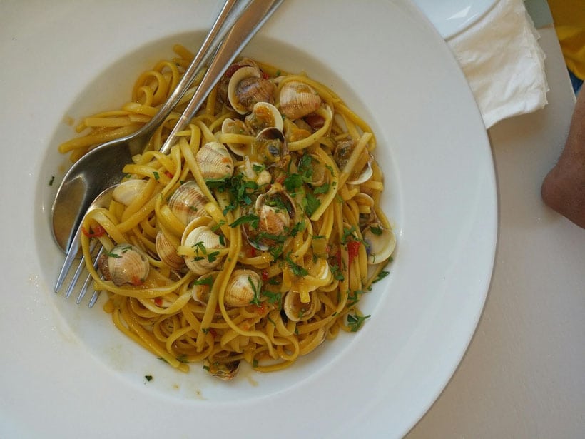 must eat foods in paros, big bowl of Linguini vongole