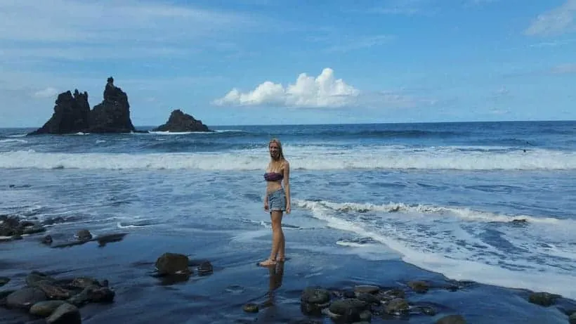 hottest place in spain in winter, standing in the water on benijo beach in tenerife north