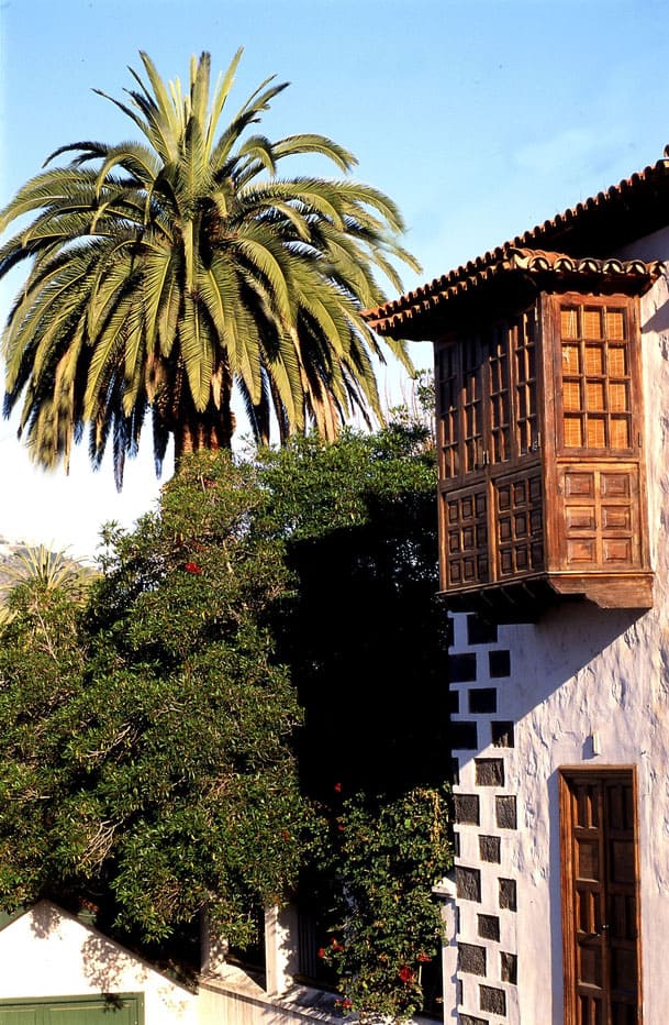 what to see and do in north tenerife, traditional building surrounded by trees and bushes