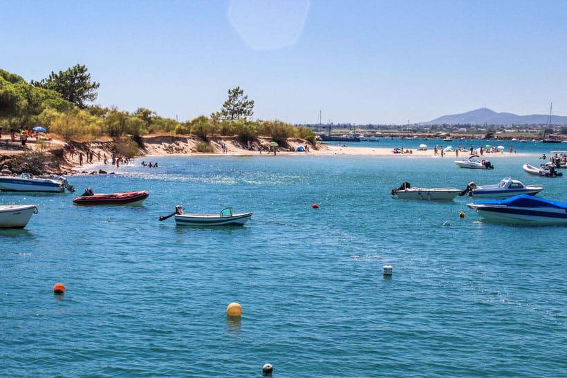 tourist attractions in algarve, boats surrounding tavira island