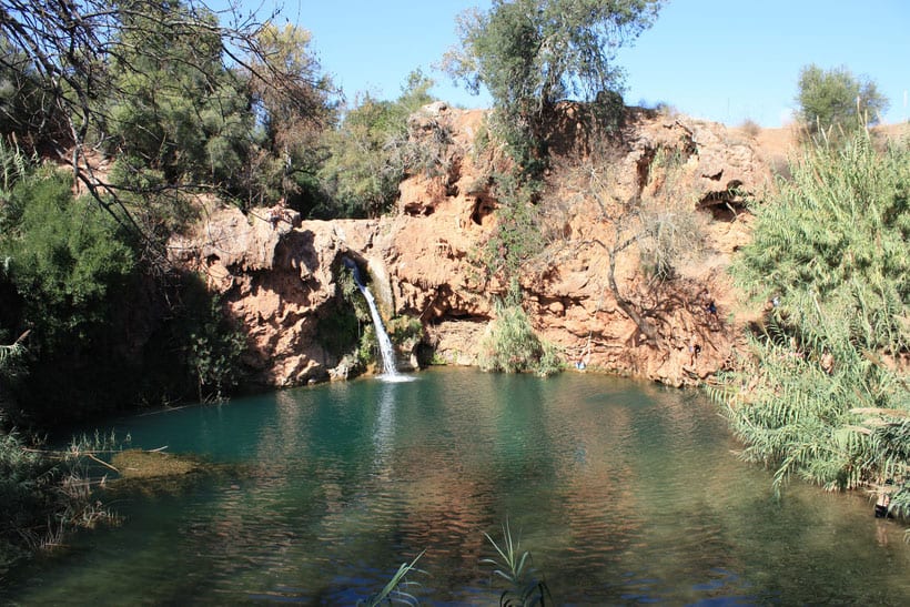 places to visit in the algarve, swimming hole at pego de inferno