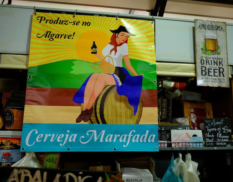 shopping in algarve in winter, outside a beer stall