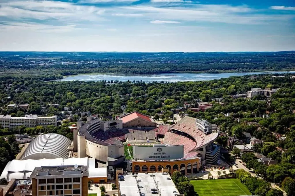 best lakes in wisconsin to live on, aerial view over madison, wisconsin with lake mendota in background
