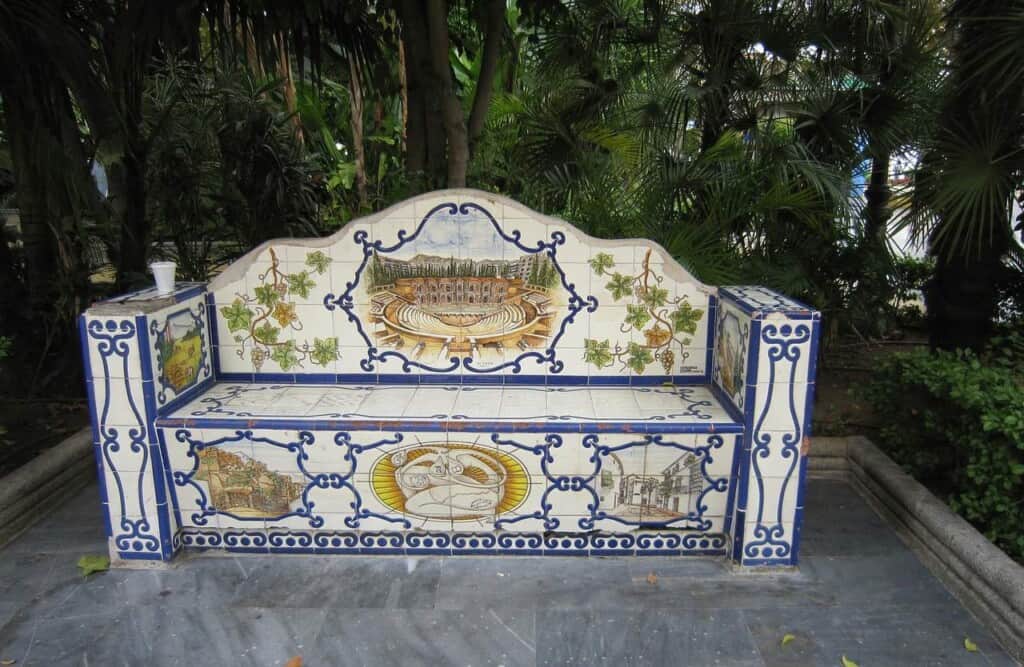 things to see in marbella, intricate park bench in marbella made of ceramics