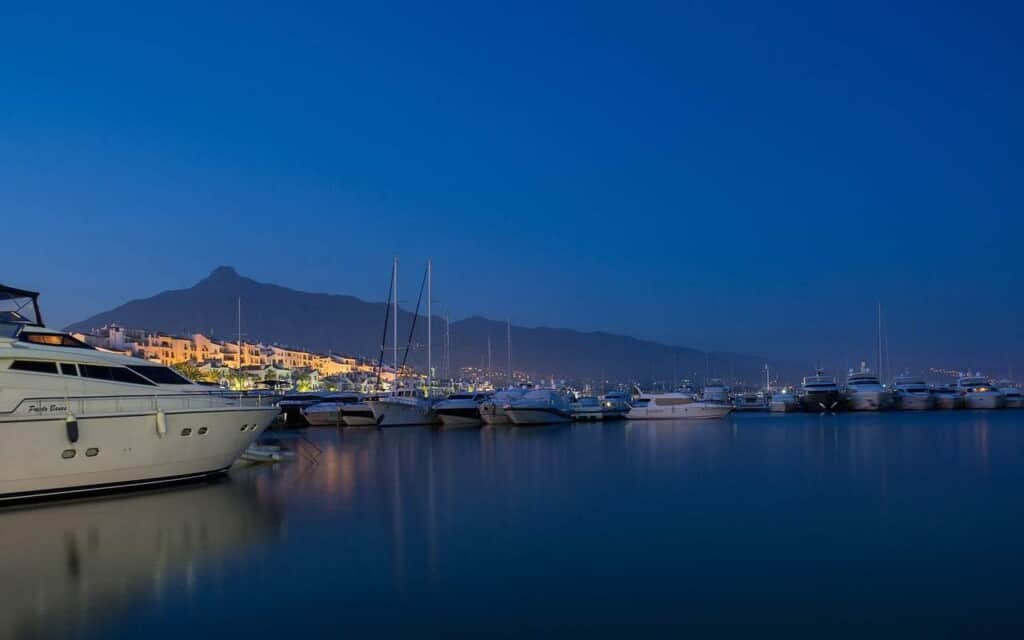 nighttime view of boats on the waterfront