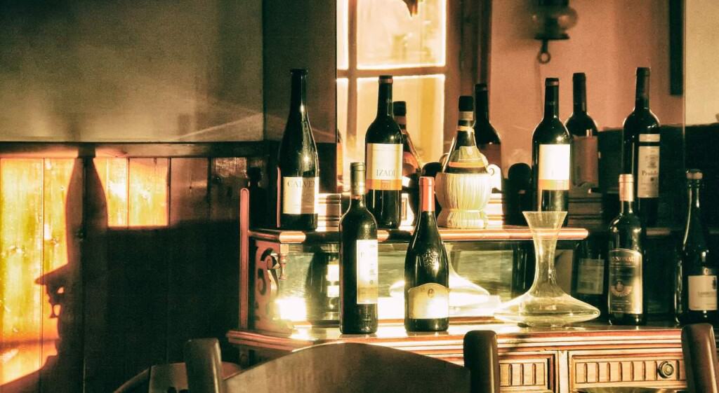 staycation idea for couples, Wine bottles in the bar