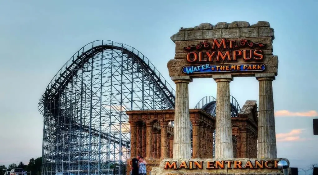 entrance to Mt Olympus water and theme pack with roller coaster in background