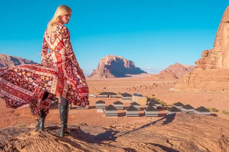 wadi rum desert camp, bedouin jordan, a woman looking sideways on a desert camp