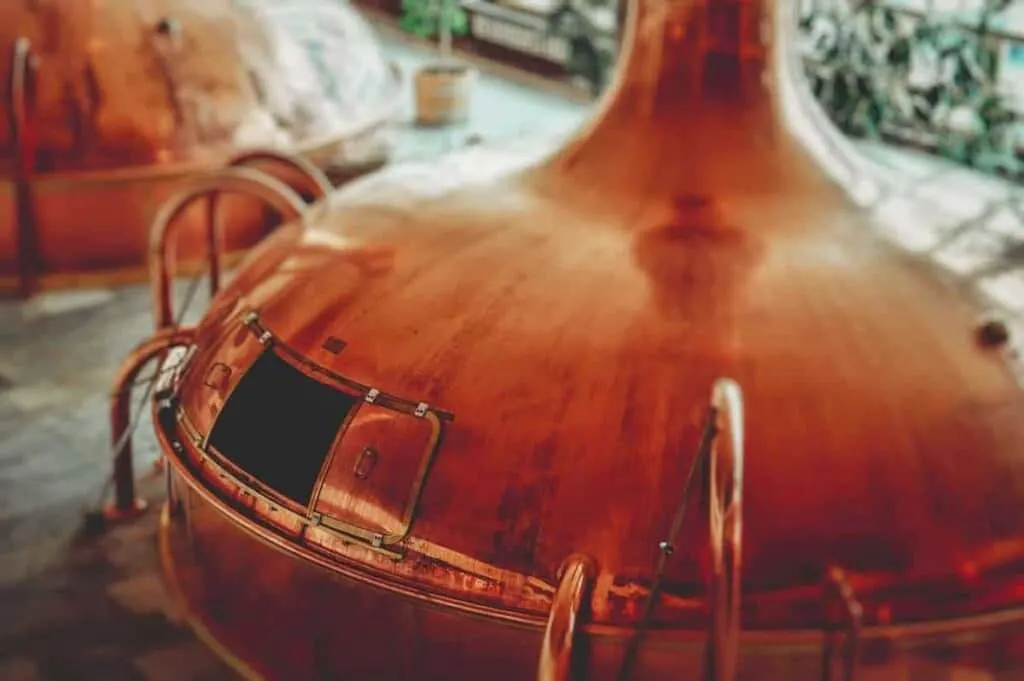 close up view of large metallic brewing equipment inside the Appleton brewery