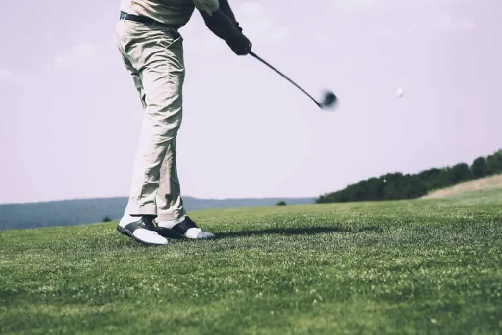 Top things to Do in Door County, WI, A men Playing golf in  golf course