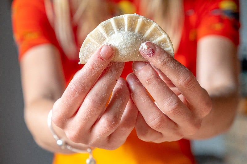 famous food of poland, making pierogi dumplings in podlasie