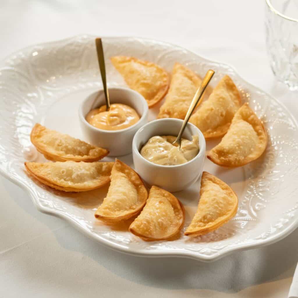 Best Polish Food An appetizer with sauces on a plate and white table background