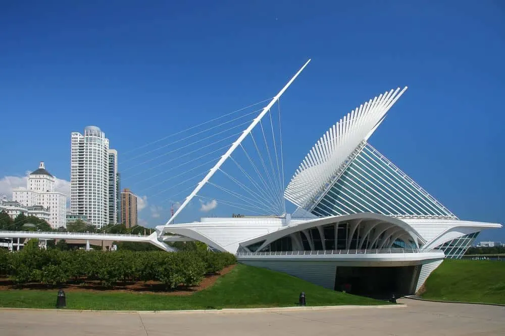 Milwaukee things to do in March, a weird looking white building on a grass with other buildings on the background