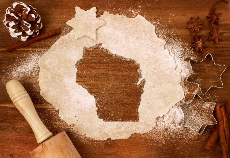 Festive cookie dough with the shape of Wisconsin cut out