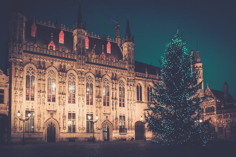 Illuminated Christmas tree on a Burg square in Bruges, Belgium