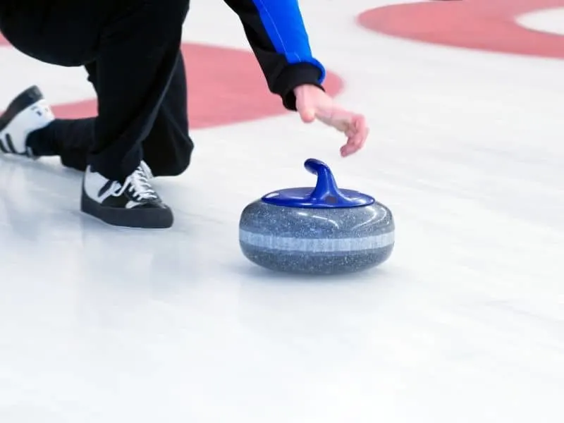 ice curling in green bay, wisconsin in winter