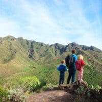 mother with little son and daughter hiking in mountains in tenerife, spain, canary islands, things to do in tenerife with kids
