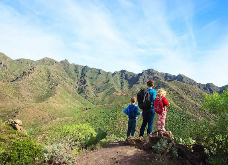 mother with little son and daughter hiking in mountains in tenerife, spain, canary islands, things to do in tenerife with kids