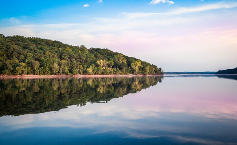 beautiful lakes in wisconsin, view of trees and sunset reflecting in Wisconsin lake