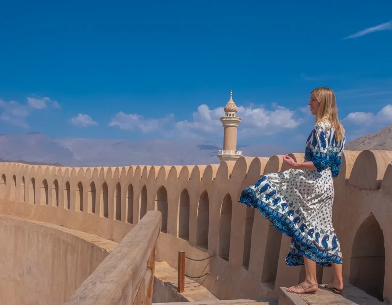 what to wear in oman, oman packing list, girl in muscat mosque, oman