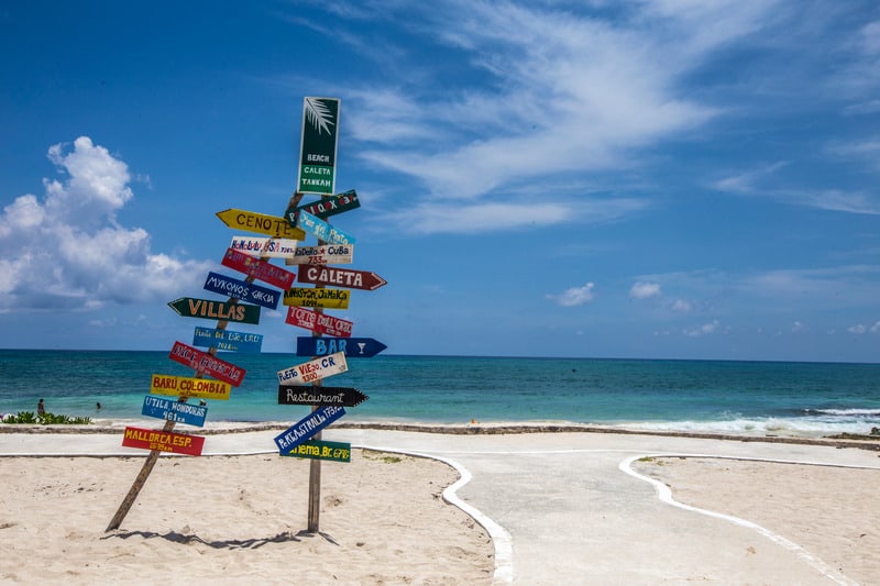 best beaches in riviera maya, palm trees, caleta tankah beach, hotels, resorts