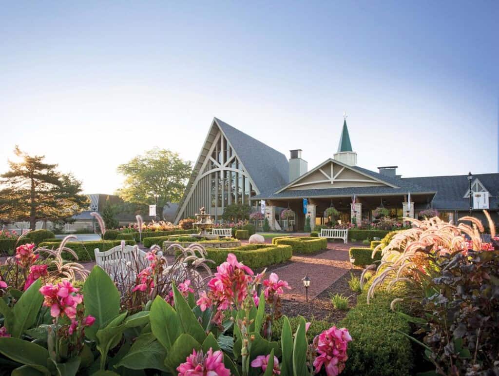 best luxury resorts in Lake Geneva WI, exterior view of the Abbey Resort and garden in Lake Geneva