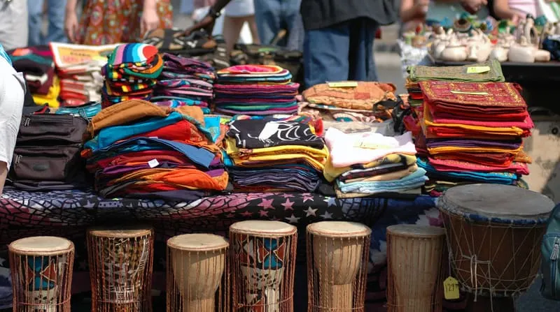 cloth and drums displayed in a market in kenosha