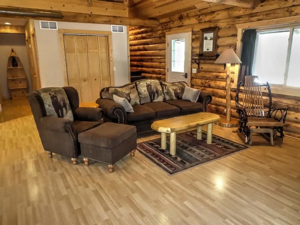 Romantic Cabins in Wisconsin, Inside view of cabin with log cabin decor & 'branch' rocking chair