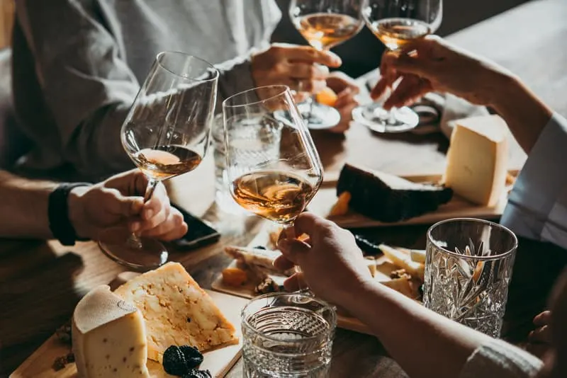 Staycation Ideas, Wine and cheese served for a friendly party in a bar or a restaurant.