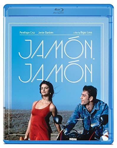 a dvd cover of Jamon Jamon with a woman in red looking far away with a man on a motorcycle looking at her