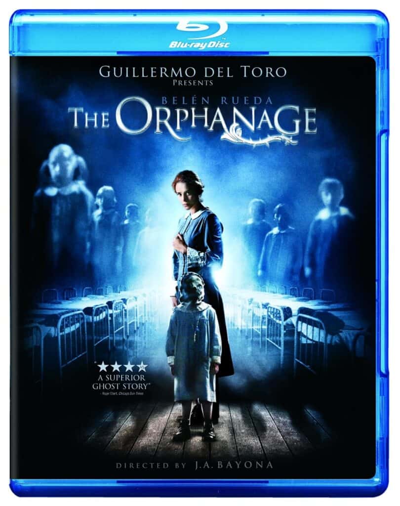 a dvd cover of the orphanage with a woman in blue looking at a creepy child with a hint of horror in the  design