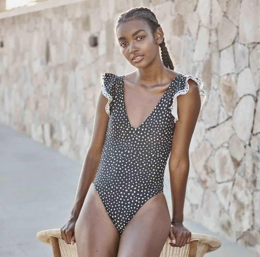 woman in dotted swimsuit; summersalt eco-friendly swimwear brand