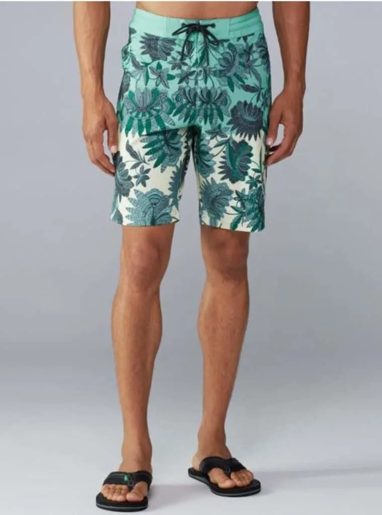 man wearing eco-friendly swimwear from Vissla; best inexpensive sustainable swimwear
