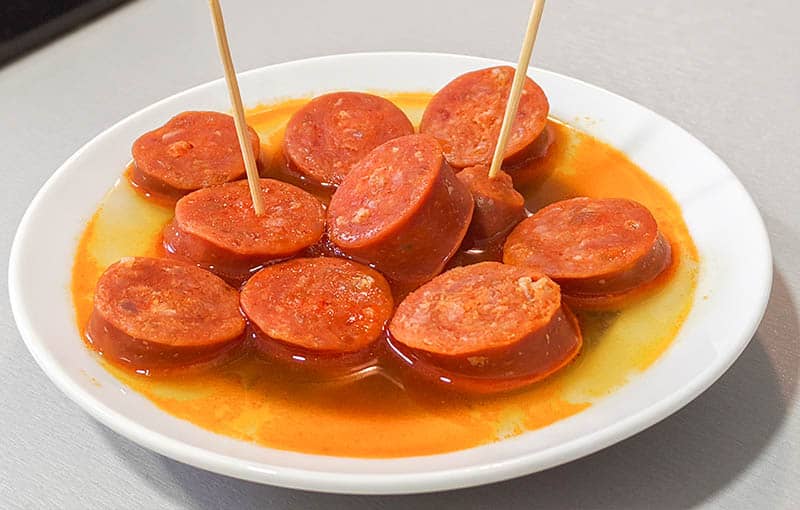 Enjoy the most famous food in Spain, Cider Chorizo dish from Asturias