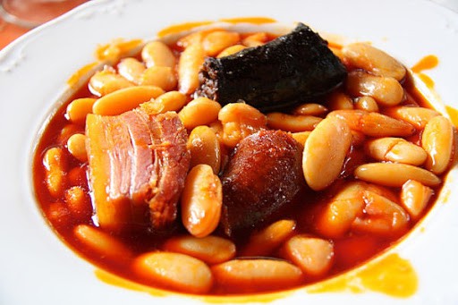 close up of Fabada dish from Asturias on a white bowl