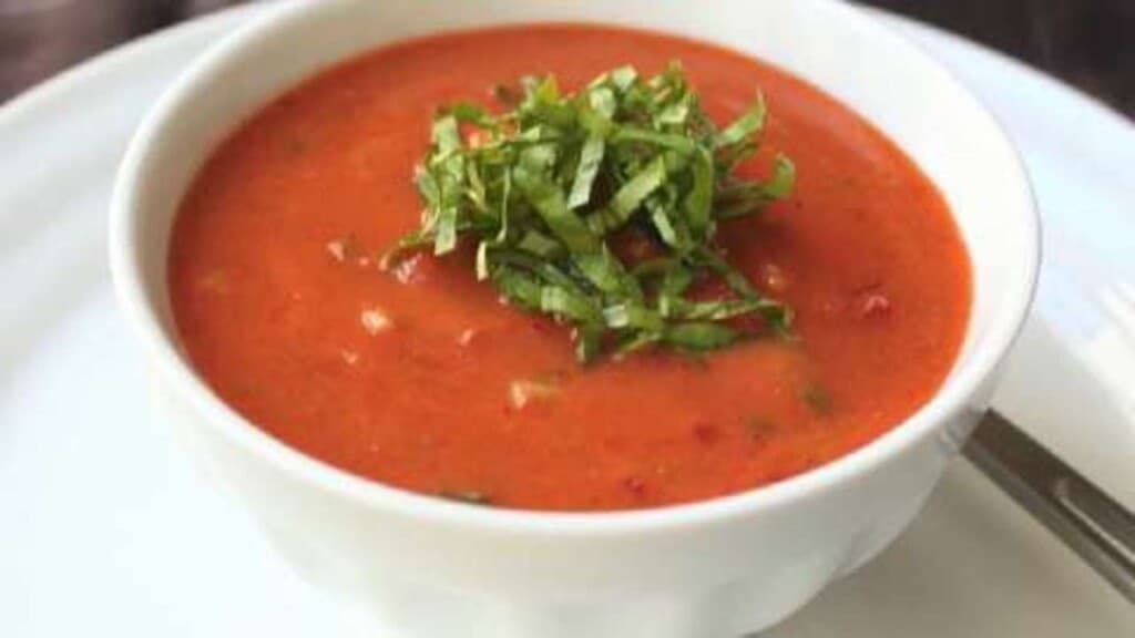 Gazpacho - Cold Tomato Soup, a red soup on a bowl with garnish toppings