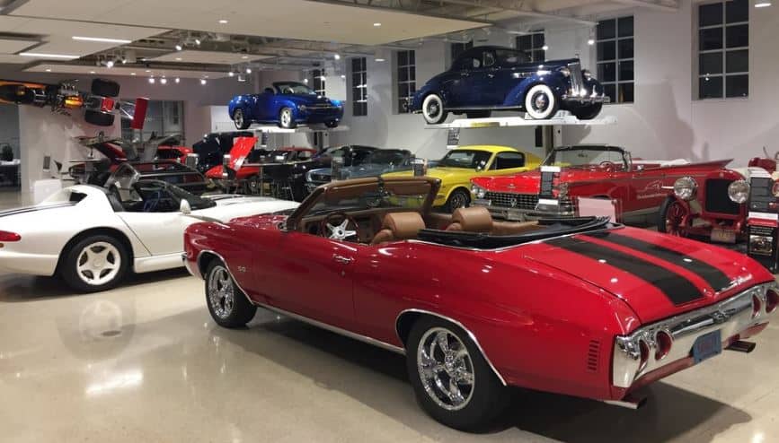 colorful vintage cars displayed inside the Automobile Gallery