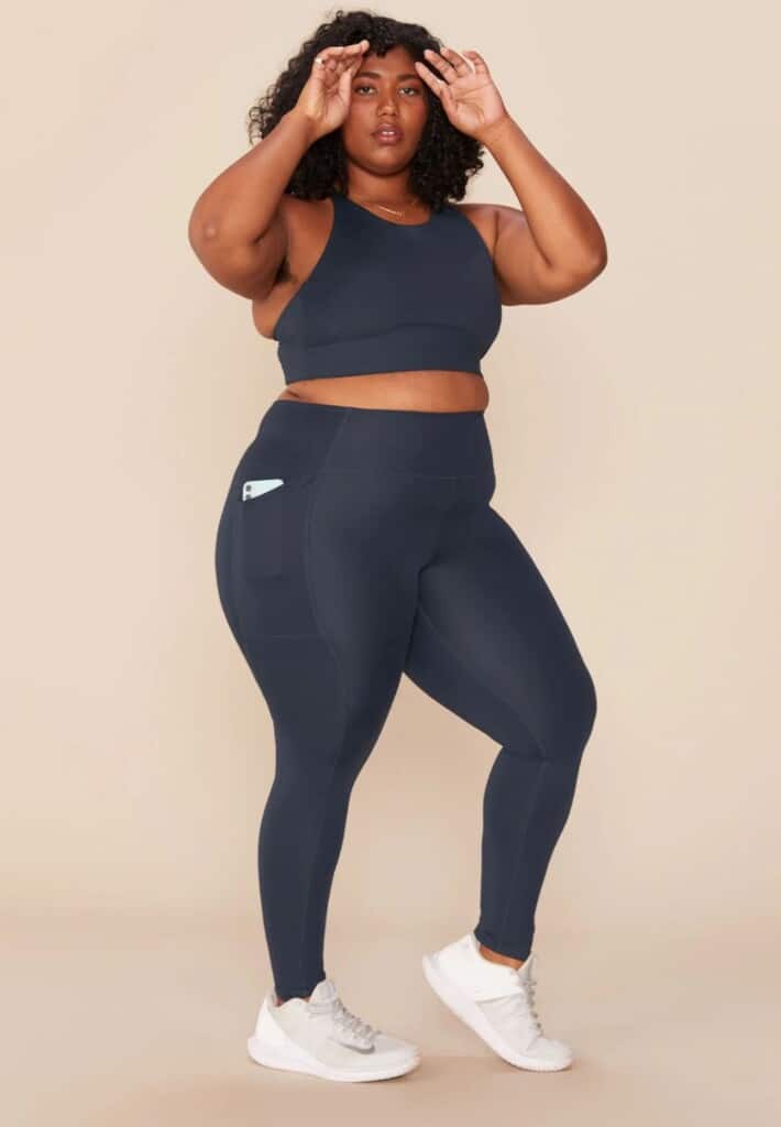 circular movement clothing brands, black woman wearing sports bra and leggings