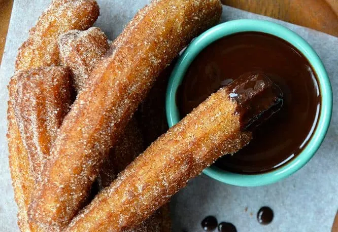 Best and tasty Spanish Sweet Snacks, Churros dipped with Chocolate