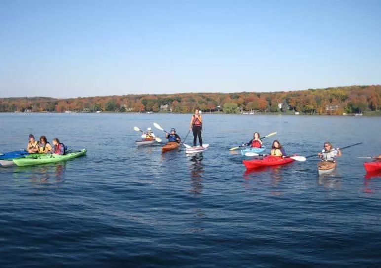 Best Lake Geneva couples getaway ideas, View of kayakers on Lake Como, Wisconsin