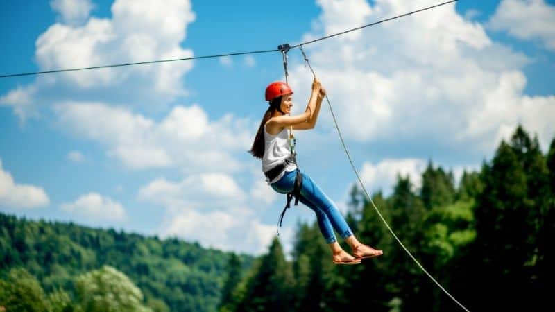 Fun things to do in Minocqua,  Women riding on a zip line