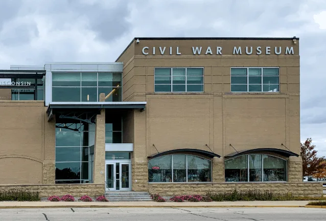 facade of the Civil War Museum building which is brown with glass windows