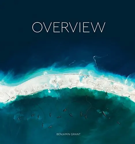 Coffee table travel book, book cover showing aerial top-down shot of archipelago with sandy beach and blue water on one side and turquoise water on the other