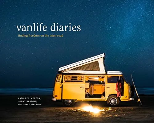 Coffee table books about travel, book cover showing campervan with extendable angled roof parked next to campfire under a vast starry sky